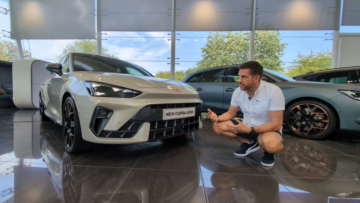 A man pointing to the CUPRA Leon