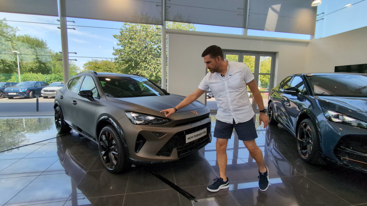 A man pointing at the CUPRA Formentor